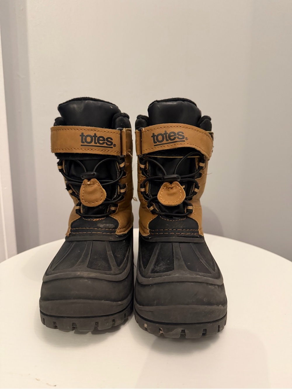 totes Tan and Black Insulated Snow Boots